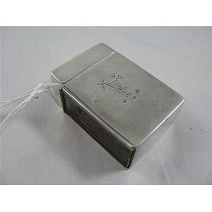 A Stirling silver matchbox, lidded. Accommodates tray from a…