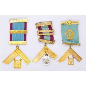 Three 9ct gold Masonic breast Jewells by Muir & Blashki. One…