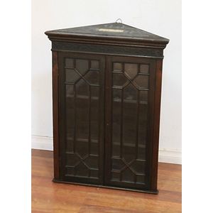 A Chippendale Revival mahogany two door miniature corner…