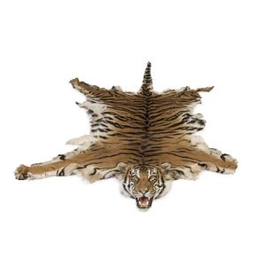 Two tiger skin rugs, formally performing tigers for the…
