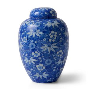 A Japanese blue and white vase, by Kanzan Denshichi (1821-1890),…