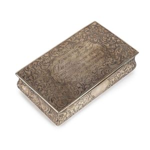 An English sterling silver snuff box engraved ' presented to…