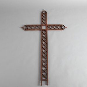 A large French iron antique crucifix, made from metal with…