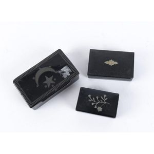 Three snuff boxes, black papier mache with inlaid silver,…
