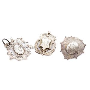 Three Early 20th century silver fob medals includes an…