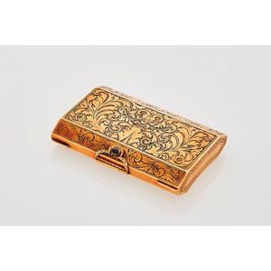 Gold snuff box, a 17ct yellow gold faceted hinged rectangular…