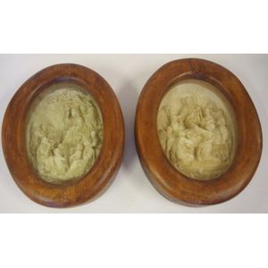 Two vintage framed in relief religious plaques, in heavy timber…