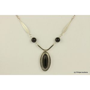 A silver onyx set necklace. Sterling silver, Danish styled as a…