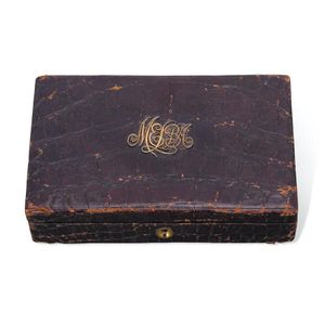 A leather mounted box rectangular, crocodile skin, the hinged…