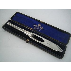 A late-Victorian silver letter opener/with propelling pencil;…