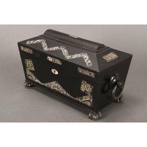 Good Regency sarcophagus tea caddy, in ebonised wood, inlaid…