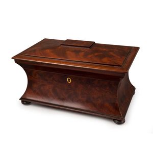 A fine English mahogany sarcophagus form tea caddy of large…