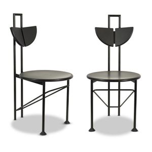 Set of six post modern dining chairs; black metal and plastic…
