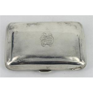 A sterling silver cigarette case, plain form, initials engraved…
