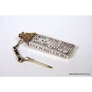 A sterling silver replica of a Saxon pocket sundial, 1975…