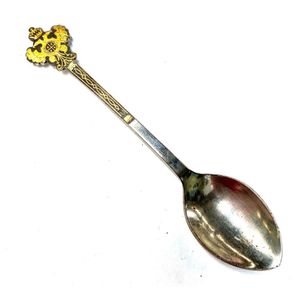 A silver plate teaspoon with black & gilt Imperial Russian crest