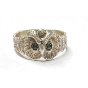 A silver metal owl ring, emerald eyes with unverified Russian…