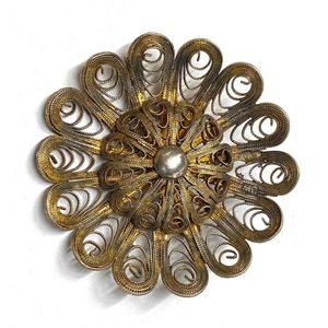 A silver metal filigree circular brooch with unverified Russian…