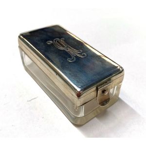 A glass, silver metal lidded box, engraved initials with…