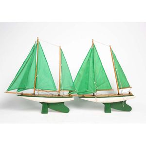A pair of green and white painted timber pond yachts, 20th…