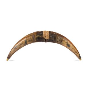 A pair of buffalo horns decorated with Australian animals and…