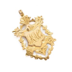 An antique 9ct medal fob pendant, cut out and engraved shied&hellip;