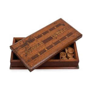 An Australian games box with cribbage top and fold-over chess…
