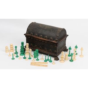 An ivory chess set, Indian, 19th century, in a carved…