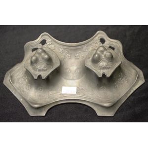 Art Nouveau pewter ink well with glass inserts, width 21.5 cm.