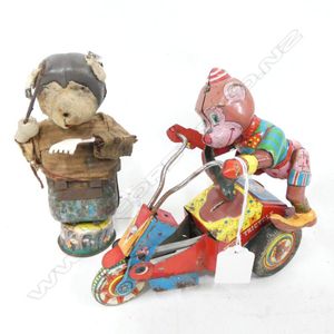 2 old tin plate toys; Conductor Wear and Tear/ rust but working,…