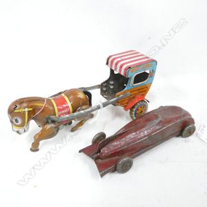 2 old tin plate toys; donkey Express donkey and cart wind up…