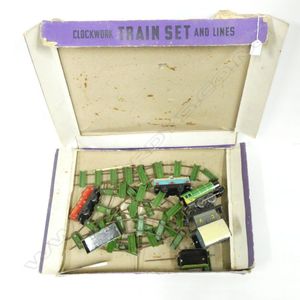 Chad Valleys clockwork train set and tracks. In original box…