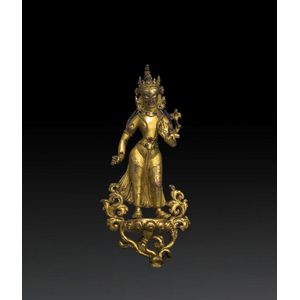 A very fine Nepalese gilt-bronze Attendant figure of a&hellip;