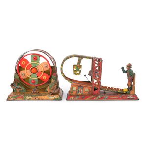 Fairground attraction tinplate & celluloid wind-ups by…