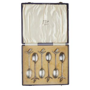 A boxed set of sterling silver teaspoons by W J Sanders,…
