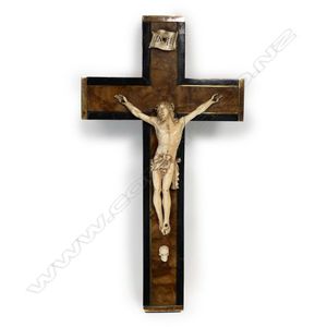 A vintage wooden crucifix, rosewood and ebony with brass edging,…