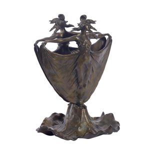 A French Art Nouveau bronze centrepiece, in the form of two…