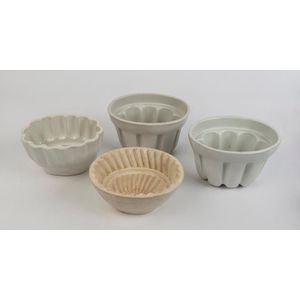 Four antique porcelain jelly moulds, 19th and early 20th…