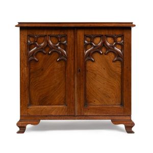 A Gothic revival elm apprentice cabinet, 19th century, the…