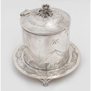 A silver plated biscuit barrel by Mappin & Webb, Sheffield,…
