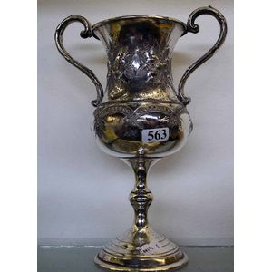 A silverplate 'Rifle Club' trophy cup 1909, engraved with…