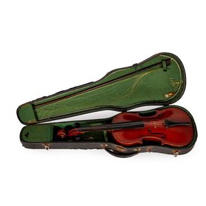 A cased violin, Early-20th century. Interior label reads…