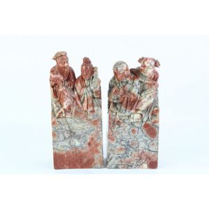Pair of stone Chinese figural bookends both featuring a well…