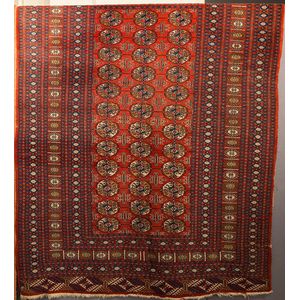 Afghan style Bokhara rug, with three central rows of octagonal…