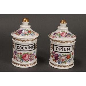 Two porcelain apothecary jars, of cylindrical form with domed…
