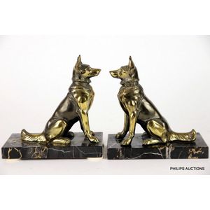A pair of Art Deco Alsatian bookends, circa 1920s, the opposite…