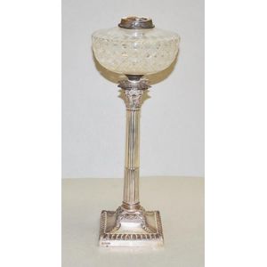 Edwardian sterling silver & glass oil lamp in the form of a…