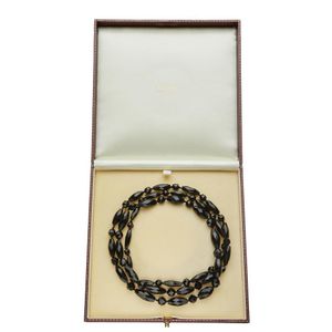 A Whitby jet necklace, the facetted oval and round beads&hellip;