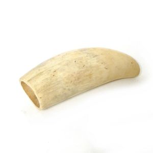An old sperm whale tooth, semi-polished finish, the base cut…