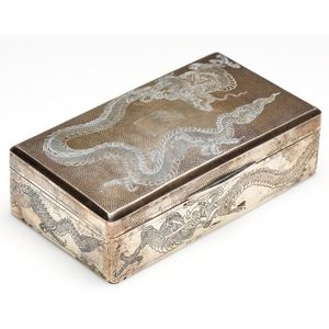 A vintage silver engraved dragon cigar box, width 16 cm